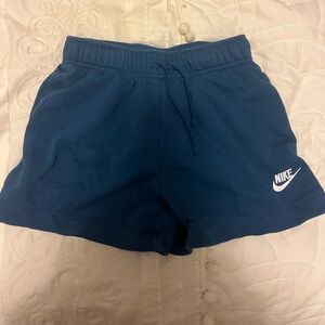 Nike women’s sportswear club fleece mid rise shorts dark blue